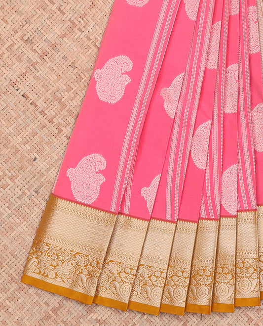 Pink Budget Silk Saree Features Zari Stripes and Paisley Buttas, Complemented by a Contrast Traditional Zari Border, a Scallop-Design Woven Zari Pallu, and a Contrast Zari-Bordered Blouse