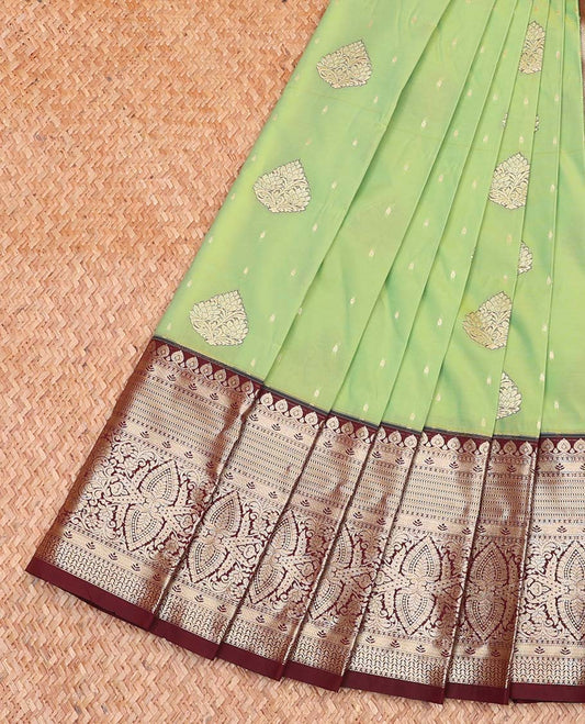 Green Budget Silk Saree, Detailed with Zari Buttas All Over Its Body, Complemented by a Contrast Traditional Zari Design Border, Grand Jaal Pallu, and Paired with a Contrast Blouse