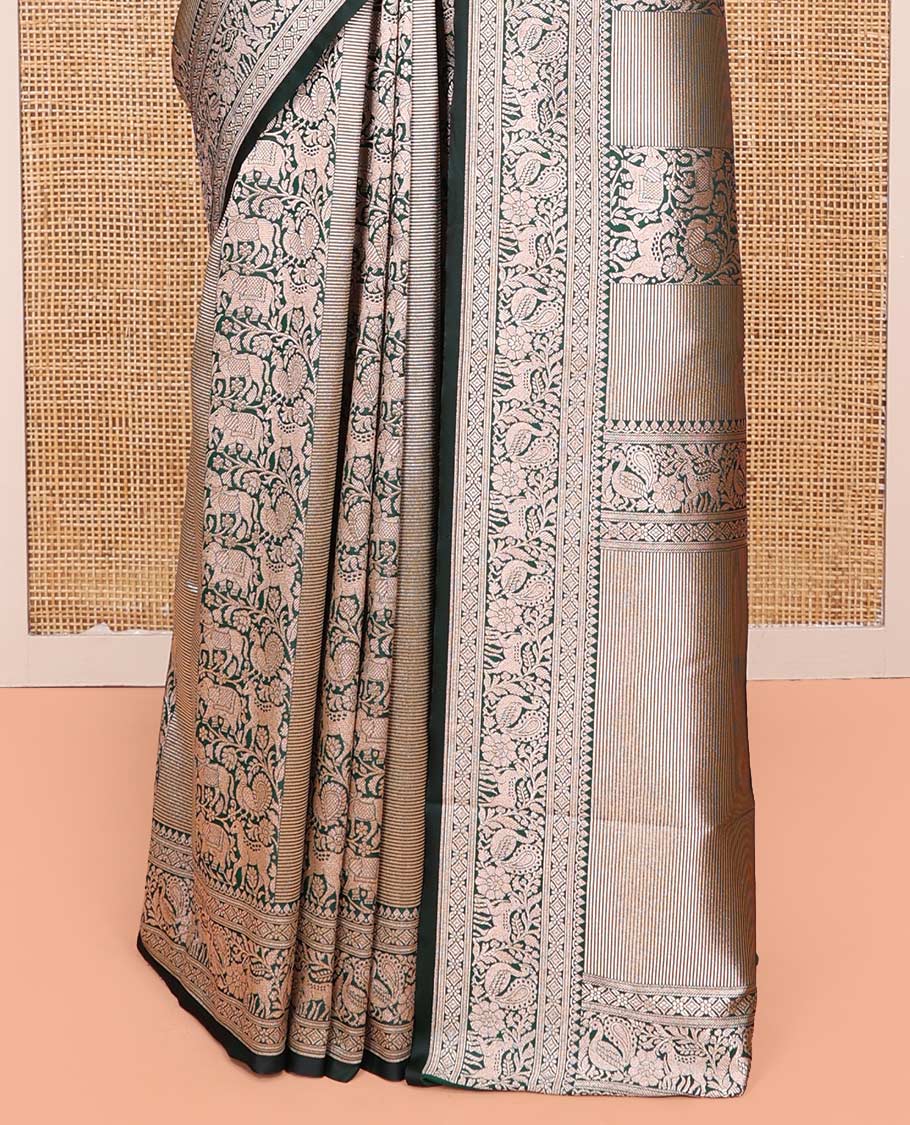 Green Semi-Banaras Silk Saree, Finely Designed with Animal-themed Jacquard Designs on Its Body, Highlighted by a Zari Border of Traditional Designs, Pallu Steeped with Stripes, and Paired with a Matching Blouse