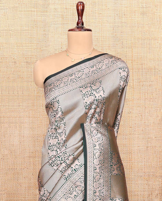 Green Semi-Banaras Silk Saree, Finely Designed with Animal-themed Jacquard Designs on Its Body, Highlighted by a Zari Border of Traditional Designs, Pallu Steeped with Stripes, and Paired with a Matching Blouse