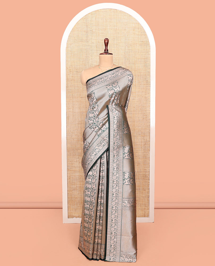 Green Semi-Banaras Silk Saree, Finely Designed with Animal-themed Jacquard Designs on Its Body, Highlighted by a Zari Border of Traditional Designs, Pallu Steeped with Stripes, and Paired with a Matching Blouse