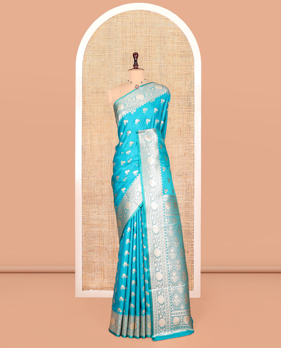 Blue Banarasi Nylon Saree, Elevated with Floral Buttas, Zari Floral Creeper Border, Intricate Pallu, and a Matching Blouse