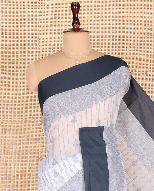 Grey Semi-Silk Cotton Saree, Sparsely Woven with Buttas and Geometric Designs All Over Its Body, Complemented by Contrast Border, Sparsely Woven Pallu of Geometric Designs, and Paired with a Matching Blouse