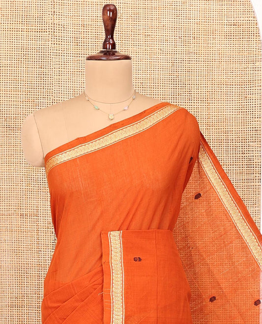 Orange Andhra Cotton Saree, Bedecked with Thread Buttas All Over Its Body, Subtly Sparked with a Diamond-Patterned Border, Contrast Pallu of Stripes and Buttas, and Paired with a Matching Blouse