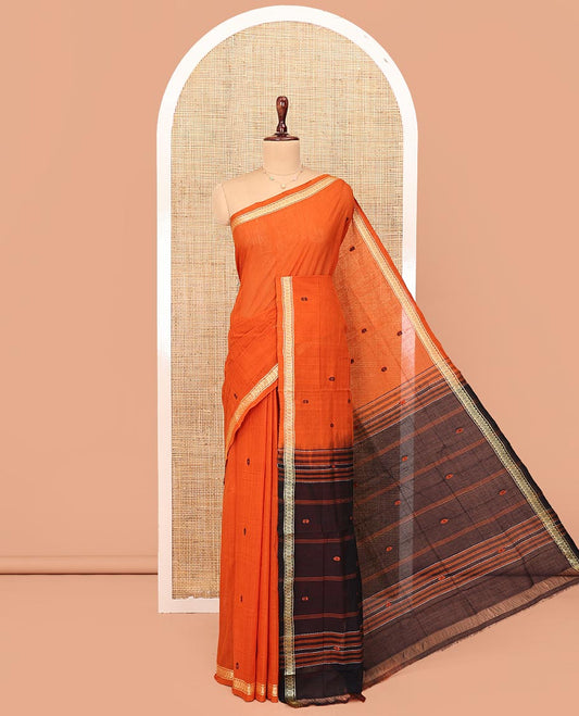 Orange Andhra Cotton Saree, Bedecked with Thread Buttas All Over Its Body, Subtly Sparked with a Diamond-Patterned Border, Contrast Pallu of Stripes and Buttas, and Paired with a Matching Blouse