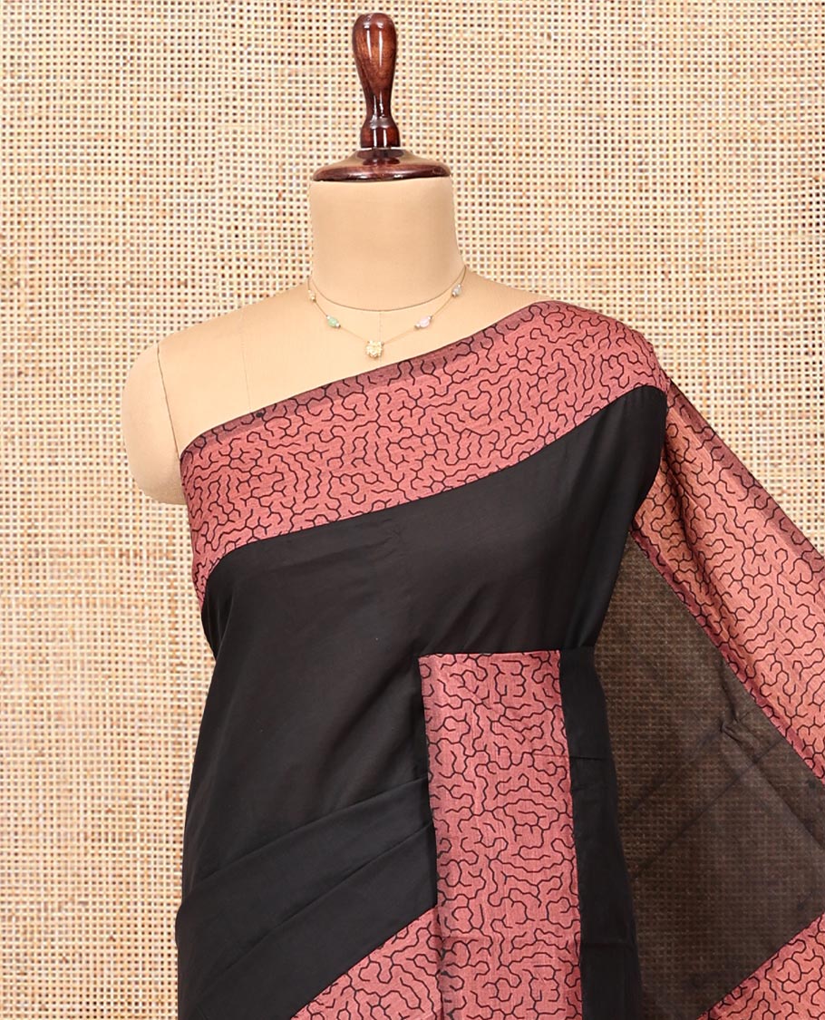 Black Plain Poly Cotton Saree, Complemented by a Contrast Geometric-Printed Border, Pallu, and a Contrast Blouse