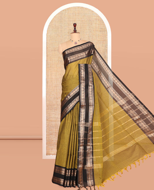 Green Plain Chettinad Cotton Saree, Complemented by a Contrast Rettai Pettu Rudraksham Zari Border, Striped Pallu, and a Matching Blouse