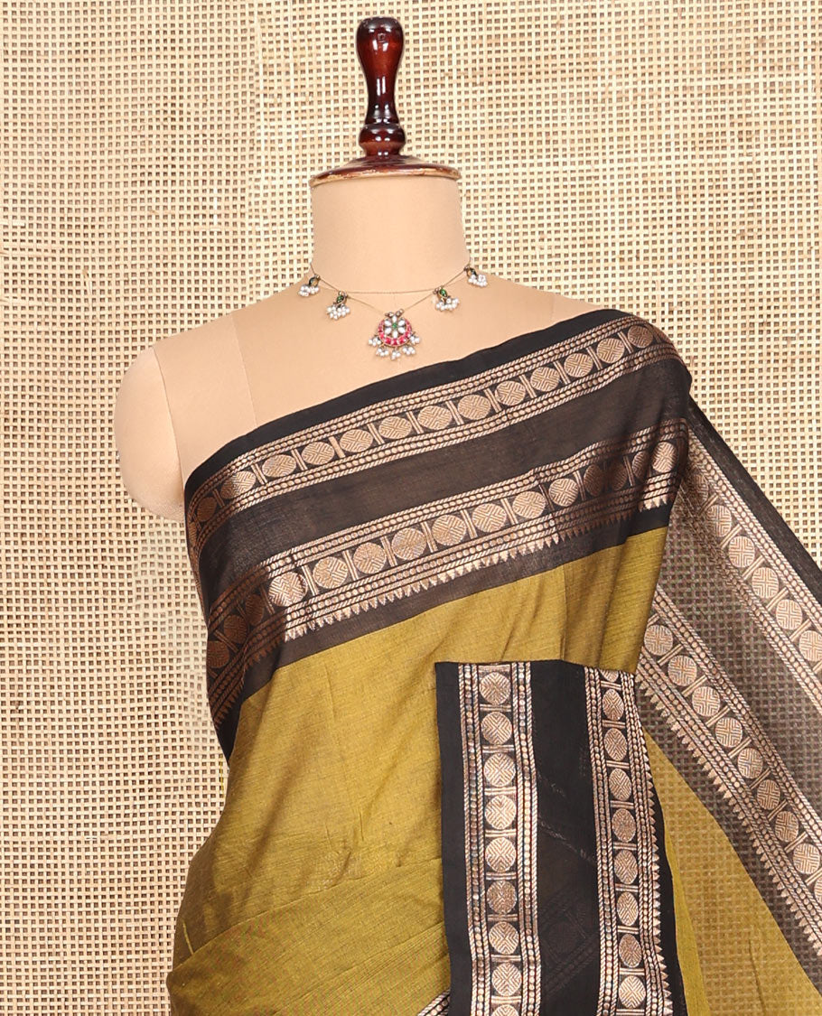 Green Plain Chettinad Cotton Saree, Complemented by a Contrast Rettai Pettu Rudraksham Zari Border, Striped Pallu, and a Matching Blouse