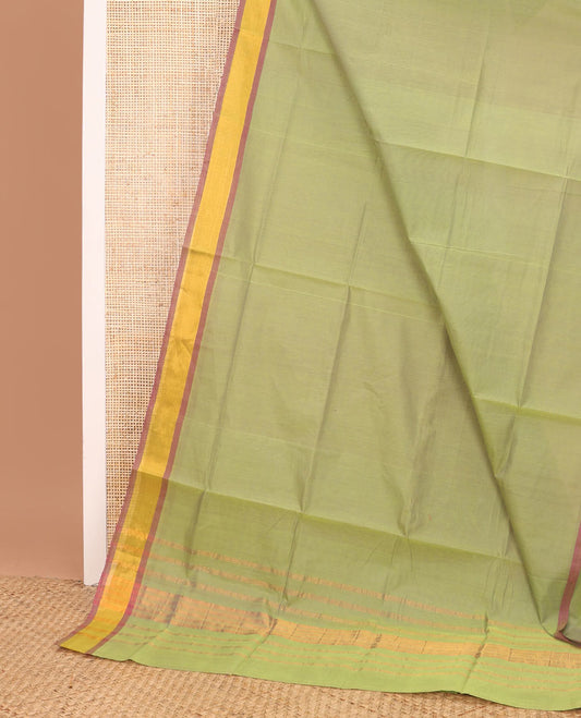 Light green venkatagiri cotton saree with contrast zari border & striped pallu