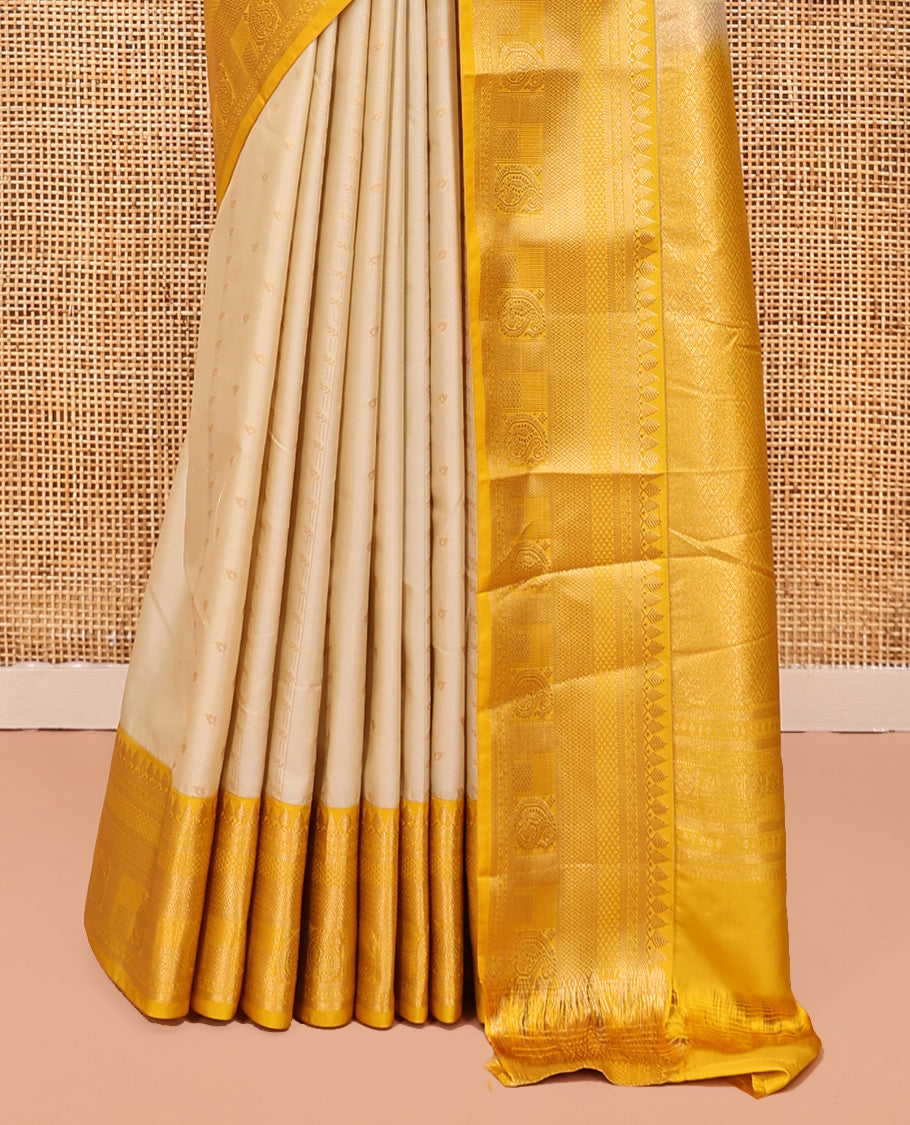 Biscuit-Yellow Budget Silk Saree, Subtly Sparkled with Zari Buttas, a Contrast Traditional Zari Border, Grand Pallu, and a Contrast Blouse