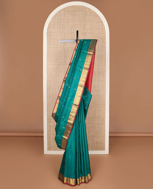 Green zari buttas Kanchipuram silk saree, contrast jaal pallu & border of thilakam,banaras,rettai neli & kodi visiry & mayil enclosed manga