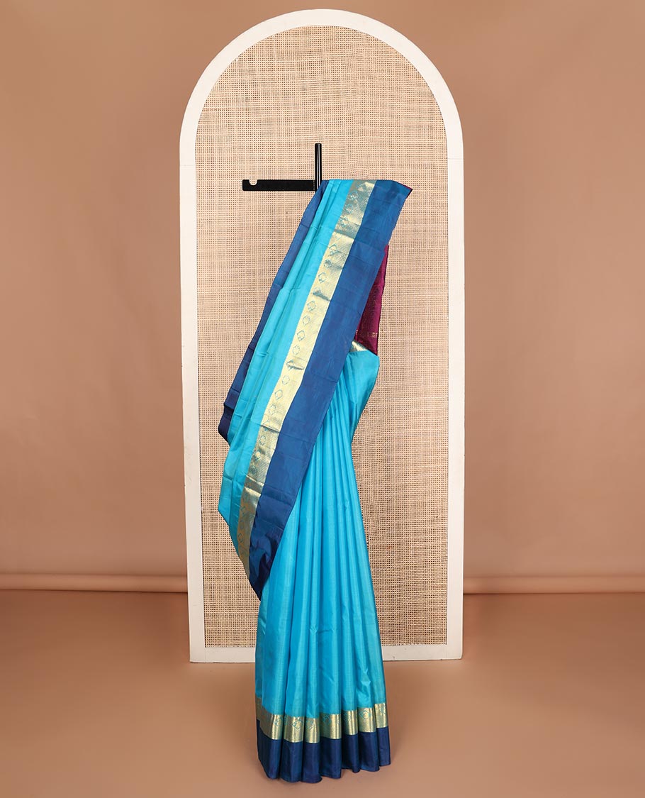 Blue zari buttas Kanchipuram silk saree, contrast border of thazampoo rekku,muthu,kamalam,manga, and kuyil kann, and zari design pallu
