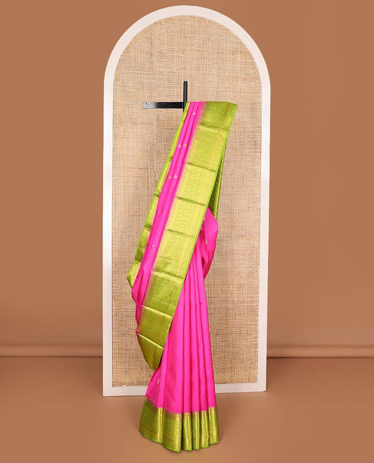 Pink zari buttas Kanchipuram silk saree, contrast zari border of vanki, kodi visiry, and poun designs, and contrast pallu of jaal design