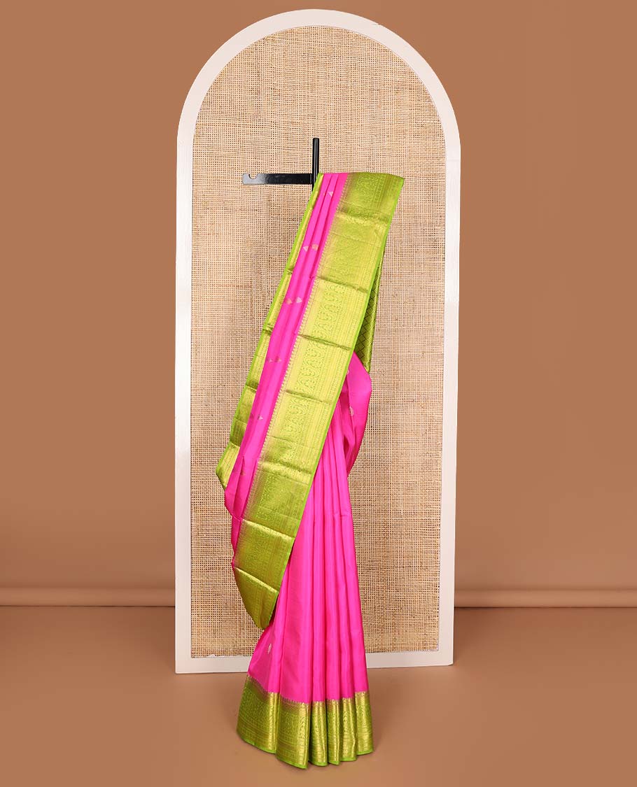 Pink zari buttas Kanchipuram silk saree, contrast zari border of vanki, kodi visiry, and poun designs, and contrast pallu of jaal design