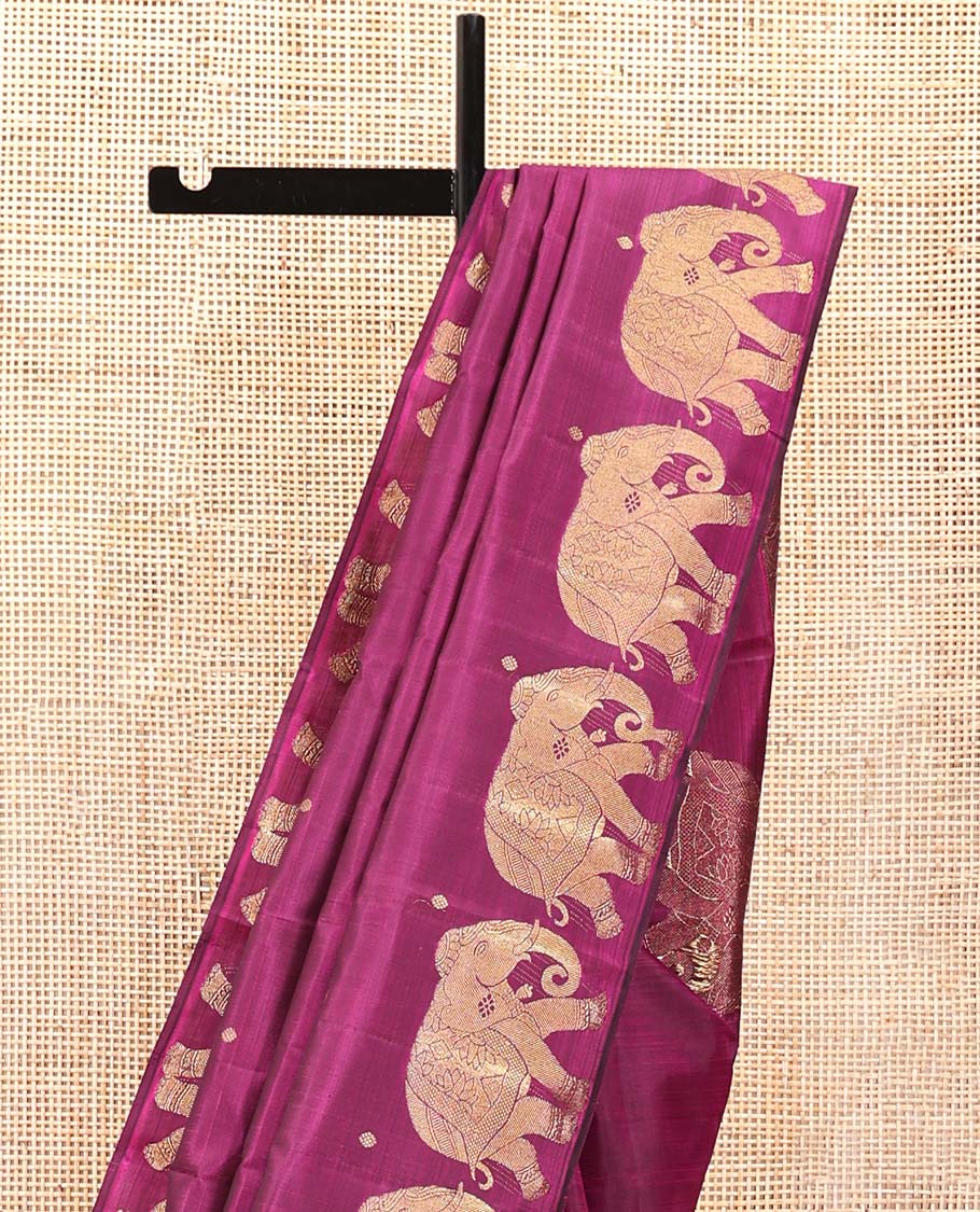 Borderless Purple Designer Silk Saree, Graced with Zari Buttas All Over Its Body, Highlighted by Elephant Motifs On Its Border, Grand Pallu and Paired with a Matching Blouse
