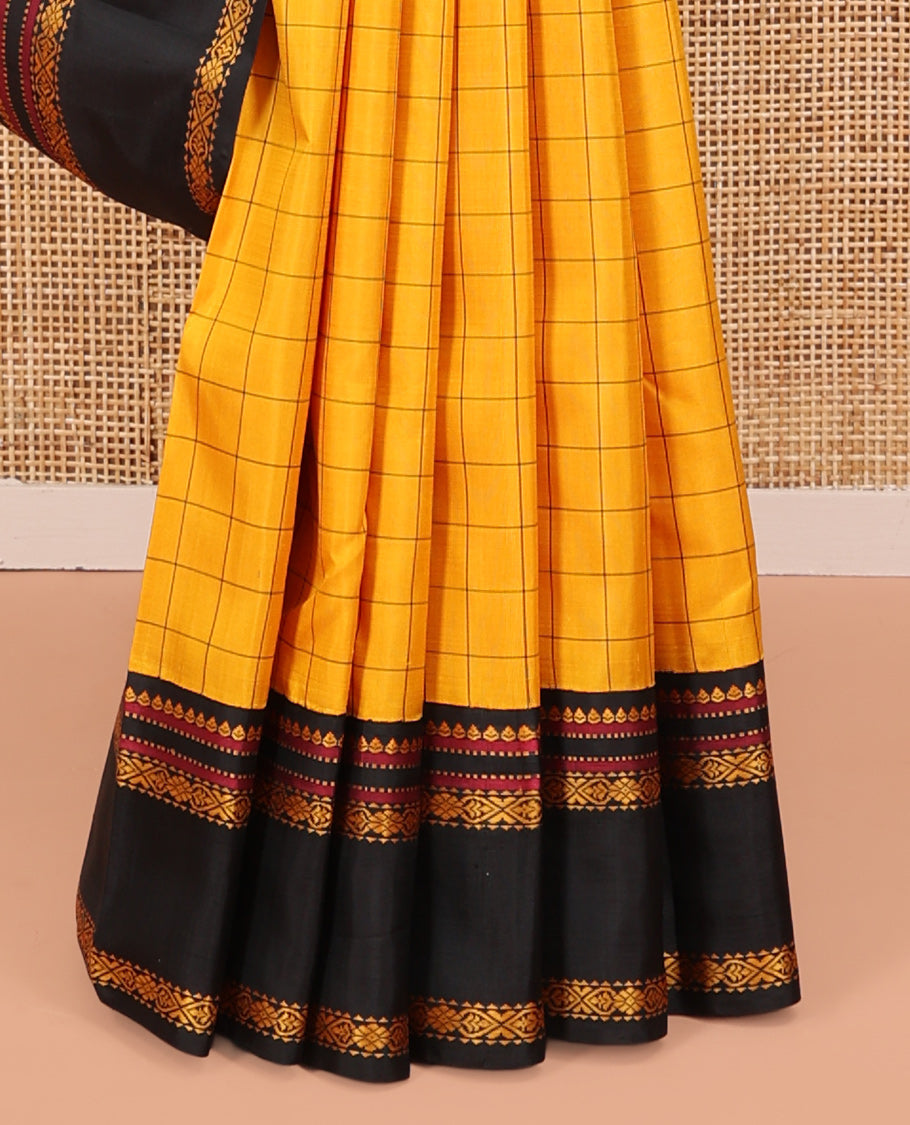 Yellow Kanchipuram Silk Saree, Sparsely Woven with Checked Design All Over Its Body, Complemented by a Contrast Rettai Pettu Border of Thilakam, Muthu, and Jada Nagam Designs, Pallu of Thazampoo Rekku Designs, and Paired with a Contrast Blouse