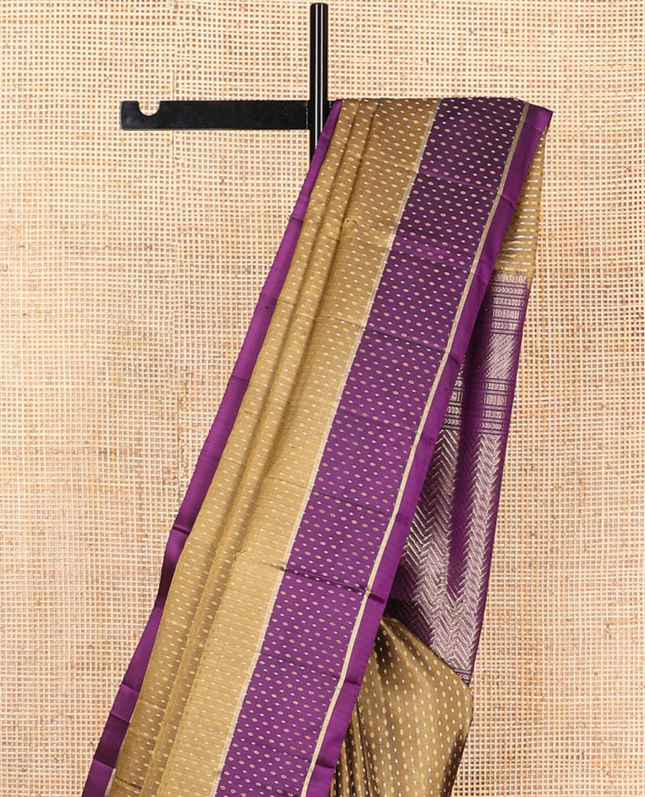 Mehendi green buttas soft silk saree, contrast buttas woven border, and pallu of geometric patterns