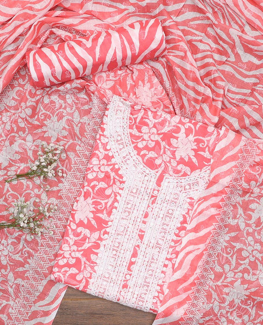 Pink cotton material churidar set, floral printed with neck embroidered top, tiger skin style printed bottom, and dupatta of floral and animal print