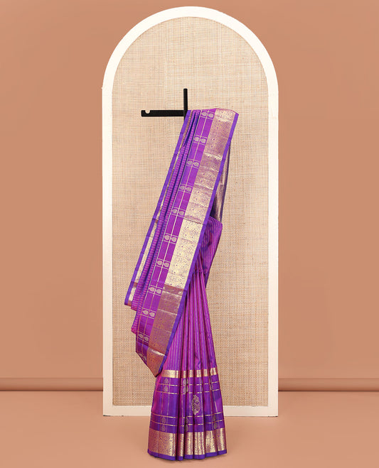 Violet Venkatagiri Silk Saree, Enthralled with Zari Stripes, Zari Buttas, and Zari Stripes All Over Its Body, Highlighted by a Traditional Zari Border of Peacock Designs, Pallu Steeped with Paisley and Triangle Designs, and Paired with a Matching Blouse
