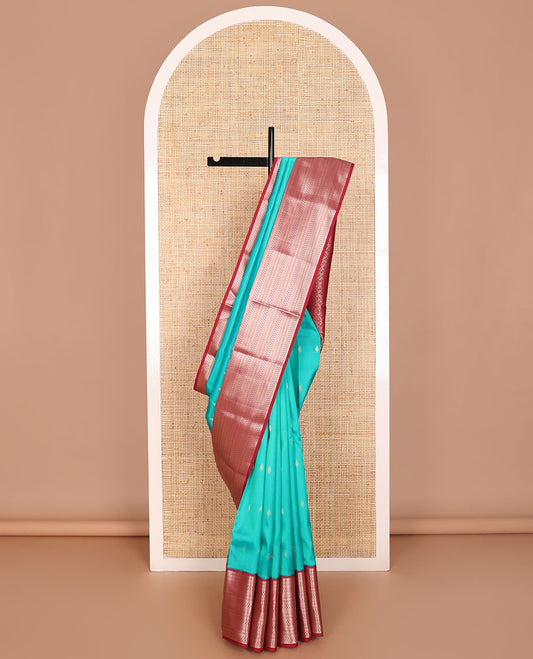 Sea blue buttas vansundhara elite silk saree with contrast traditional zari design border & paisley design pallu