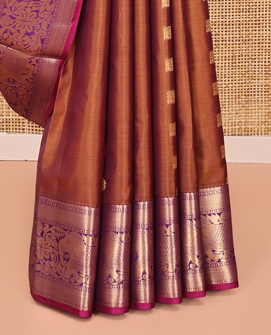 Brown Vasundhara Lite Silk Mix Saree, Subtly Sparkled With Zari Buttas All Over Its Body, Complemented by Mayil Kann And Yaanai Designs, Grand Jaal Pallu and Paired with a Contrast Blouse
