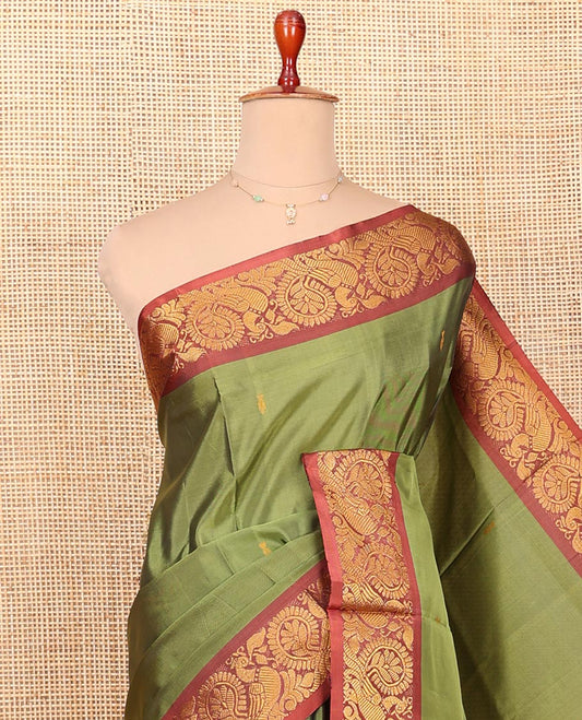 Green Banana Pith Saree Woven with Buttas All Over the Body, Complemented by a Contrast Rettai Pettu Peacock Motifs Zari Border, Contrast Pallu Featuring Stripes and Buttas, and Paired with a Contrast Blouse