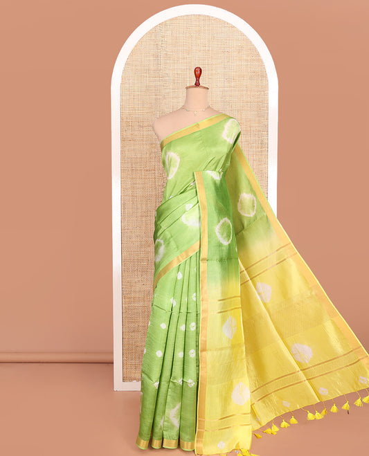 Green Banana Pith Saree Simply Sparkled with Shibori Prints, Zari Bavanji Border, Complemented with a Contrast Printed Pallu of Shibori Motifs, and Paired with a Contrast Blouse