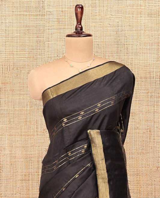 Black Banana Pith Saree, Enthralled with Buttas and Stripes on Its Body, Subtly Zari Border, Pallu Steeped with Zari Stripes, and Paired with a Matching Blouse