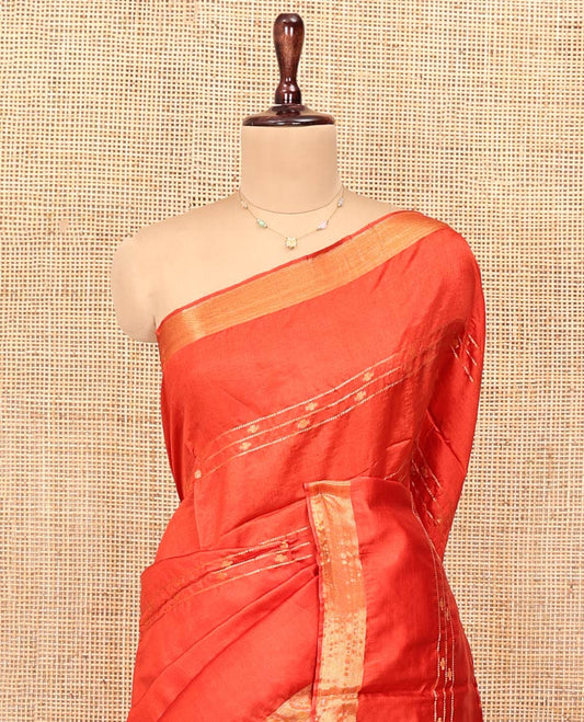 Orange Banana Pith Saree, Decked Up with Buttas and Stripes All Over Its Body, Highlighted by Self-Border, Pallu of Zari Stripes, and Paired with a Matching Blouse
