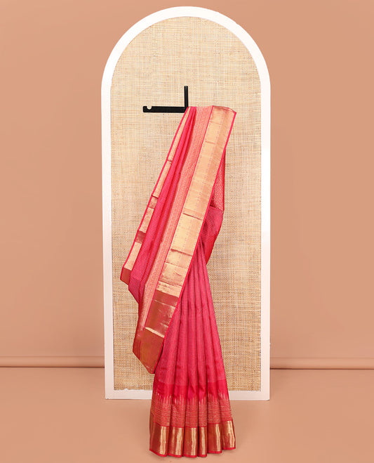 Red Vasundhara Silk Saree, Gleamed Up with Zari Muthu Stripes on Its Body, Highlighted by Zari Border of Traditional Designs, Geometric-Patterned Pallu, and Paired with a Matching Blouse