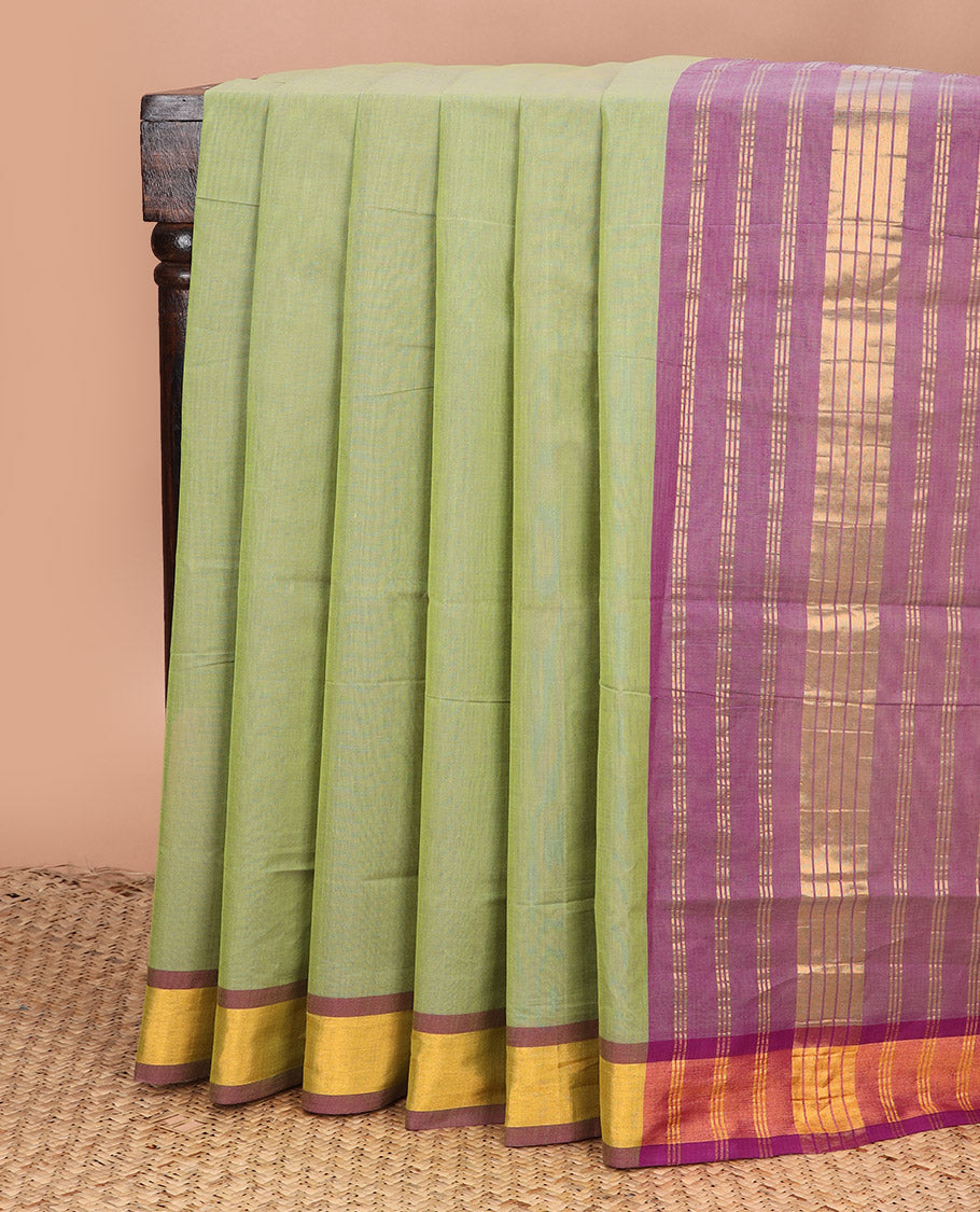 Parrot green plain Venkatagiri cotton saree, contrast plain border, and zari striped pallu