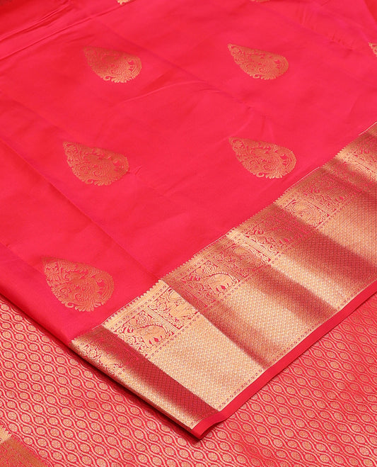 Red zari buttas Vasundhara silk mix, zari border of rekku, yaanai, mayil, and jaal, and ogee patterned pallu
