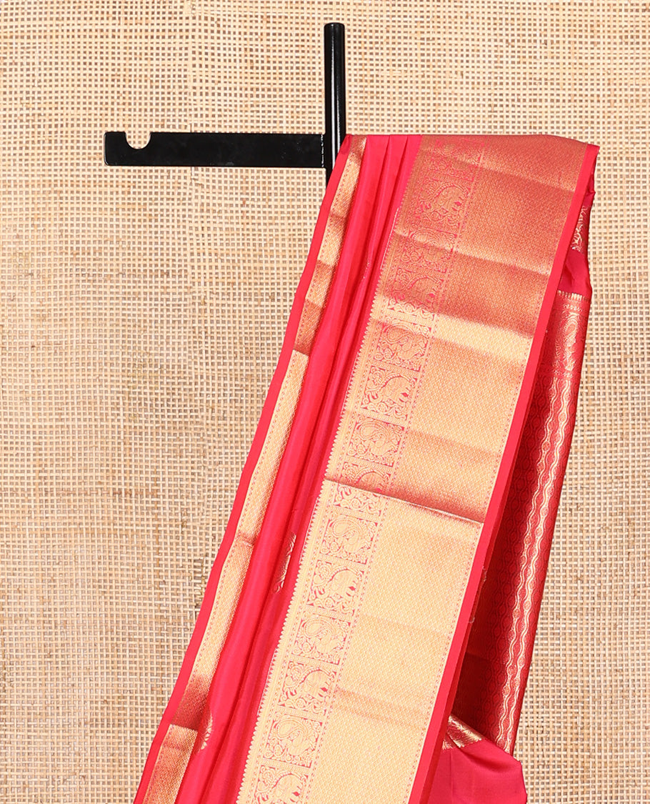 Red zari buttas Vasundhara silk mix, zari border of rekku, yaanai, mayil, and jaal, and ogee patterned pallu