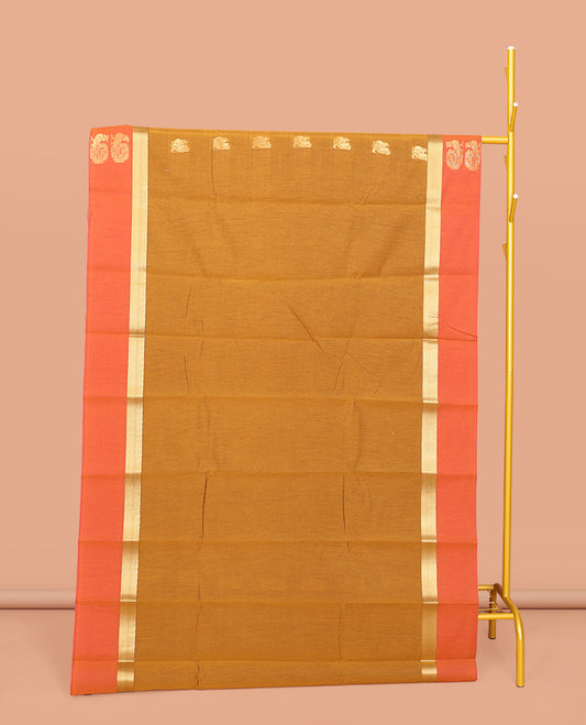 Mustard Semi-Silk Cotton Saree, Ornamented with Peacock Buttas All Over Its Body, Complemented by a Contrast Border of Peacock Designs, Pallu Steeped with Peacock Designs, and Paired with a Contrast Blouse