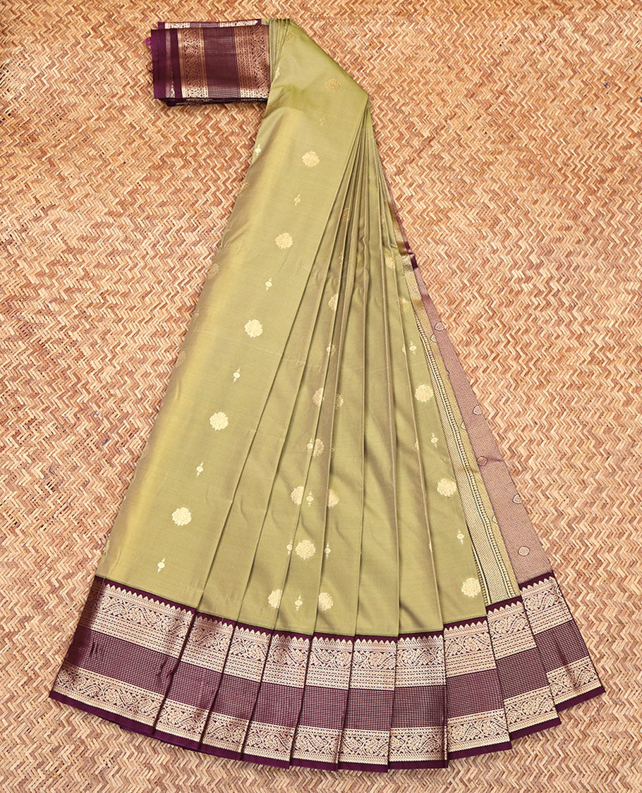 Green Budget Silk Saree, Adorned with Zari Buttas All Over Its Body, Complemented by Contrast Border of Traditional Zari Designs, Gleaming Zari Design Pallu, and Paired with a Contrast Blouse