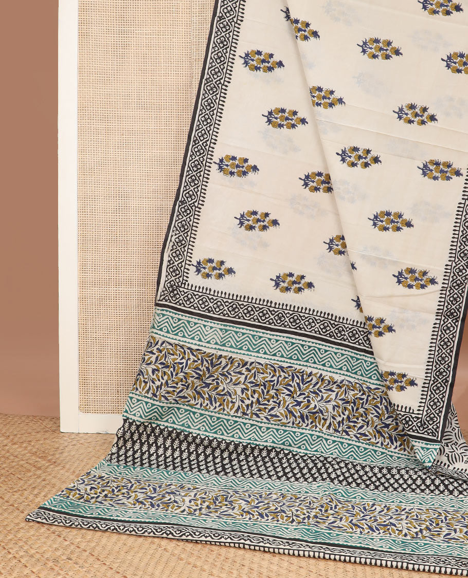 Cream floral motifs printed mul mul cotton saree, geometric block printed border & pallu of floral-geometric block print