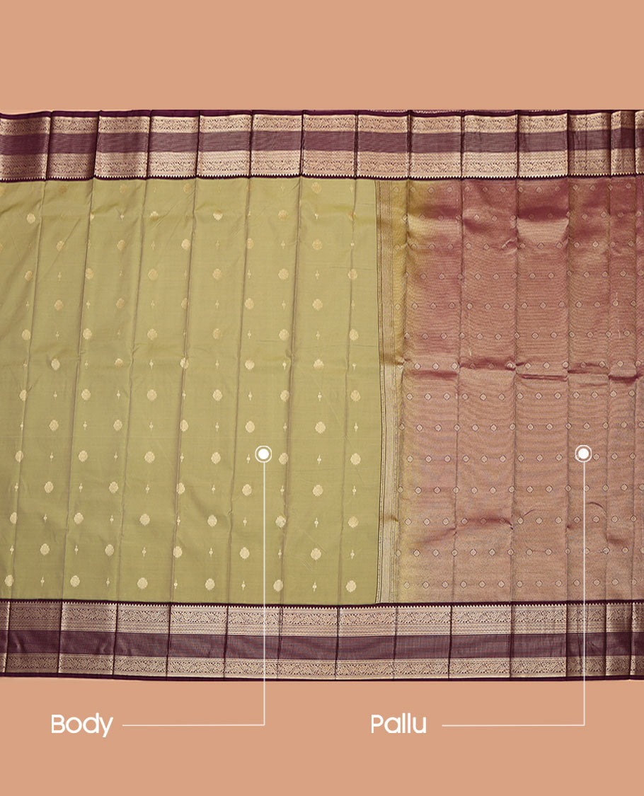 Green Budget Silk Saree, Adorned with Zari Buttas All Over Its Body, Complemented by Contrast Border of Traditional Zari Designs, Gleaming Zari Design Pallu, and Paired with a Contrast Blouse