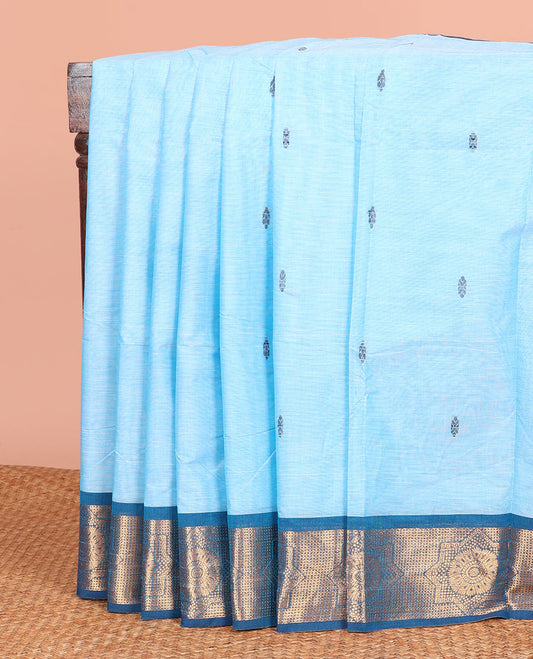 Blue Chettinad Cotton Saree Subtly Woven with Buttas on Its Body, Complemented by a Contrast Chakram Motifs Woven Zari Border, Subtly Striped Pallu, and Paired with a Matching Blouse