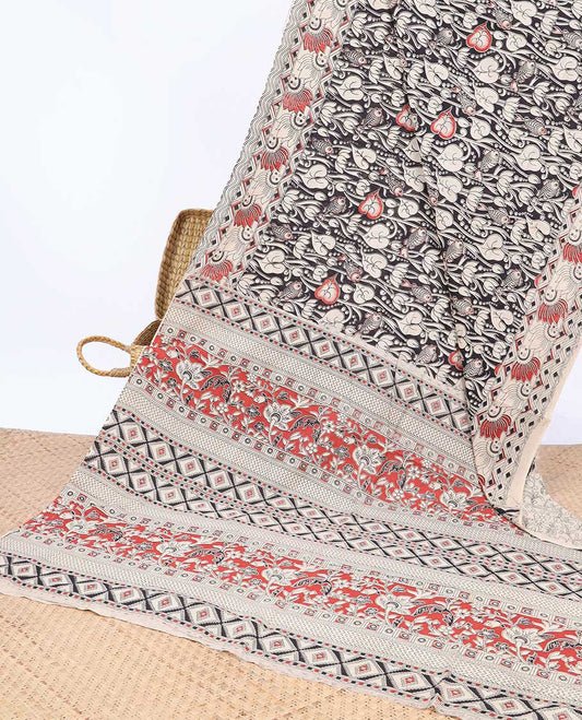 Black unique floral machine-printed kalamkari cotton saree, contrast floral border & floral & diamond pallu