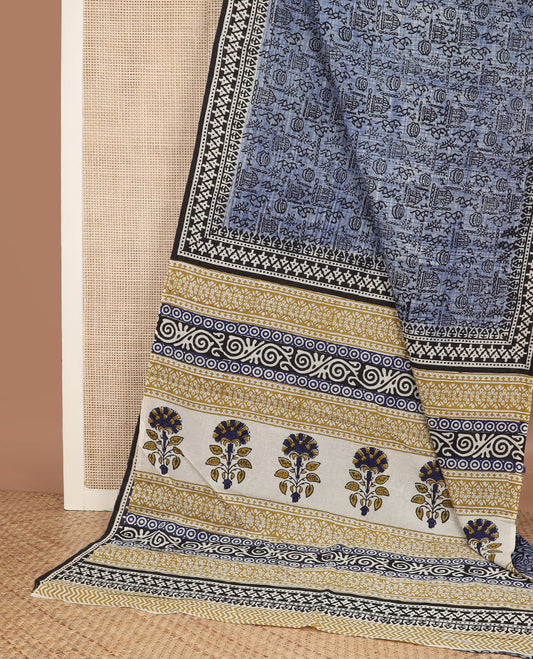 Blue warli village printed mul mul cotton saree, contrast geometric block printed border & pallu of floral-geometric block print