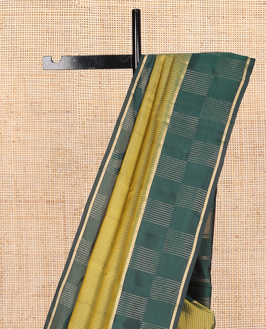 Green zari striped Vasundhara silk mix, contrast zari border and zari design pallu
