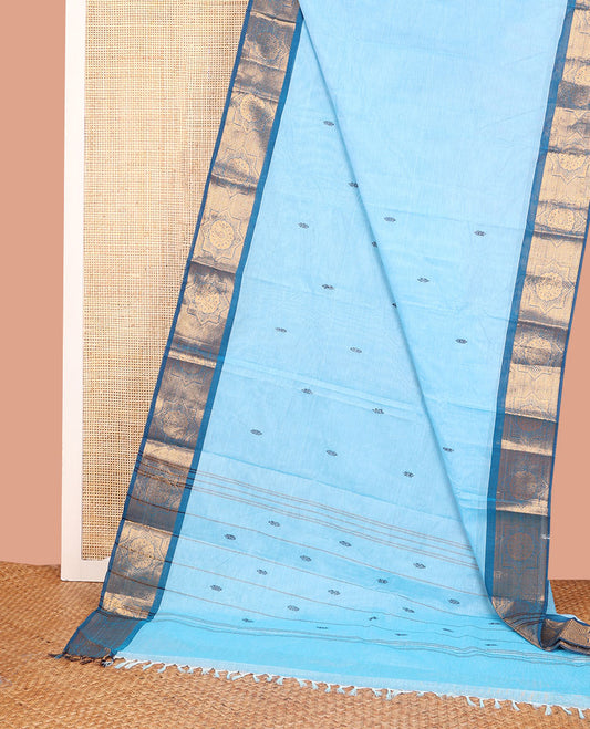 Blue Chettinad Cotton Saree Subtly Woven with Buttas on Its Body, Complemented by a Contrast Chakram Motifs Woven Zari Border, Subtly Striped Pallu, and Paired with a Matching Blouse