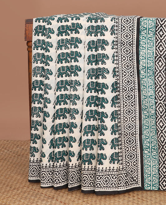 Cream elephant motifs printed mul mul cotton saree, geometric block printed border & pallu of floral-geometric block print