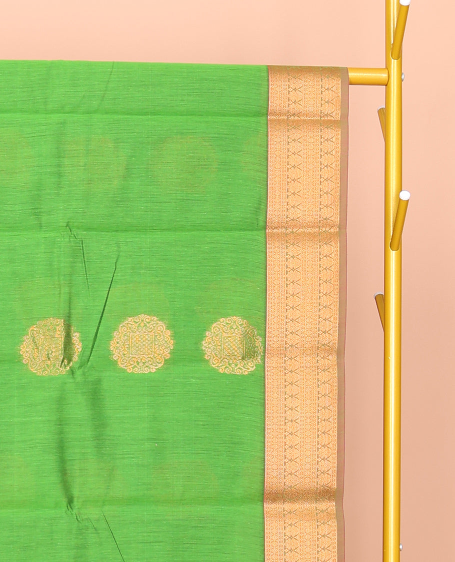Green Semi-Silk Cotton Saree, Bedecked with Zari Buttas All Over Its Body, Complemented by a Contrast Border of Traditional Zari Designs, Grand Jaal Pallu, and Paired with a Contrast Blouse