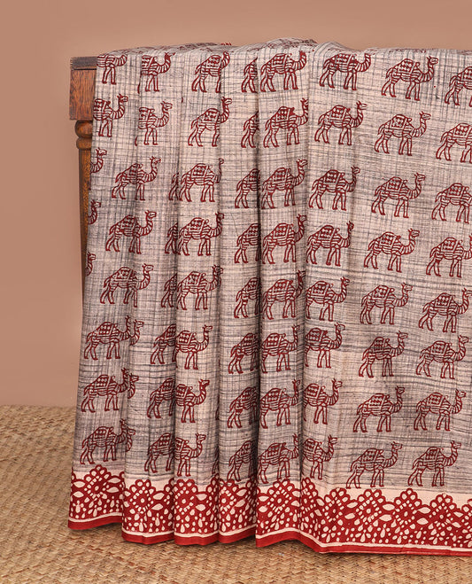 Brown camel motifs printed mul mul cotton saree, contrast block printed border & pallu of floral-geometric block print