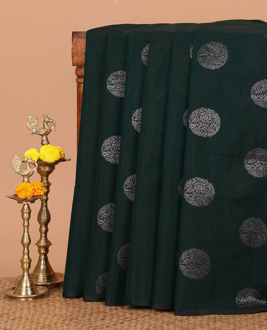 Borderless green silk cotton saree with circular-shaped zari buttas, contrast pallu of floral creeper & jaal design
