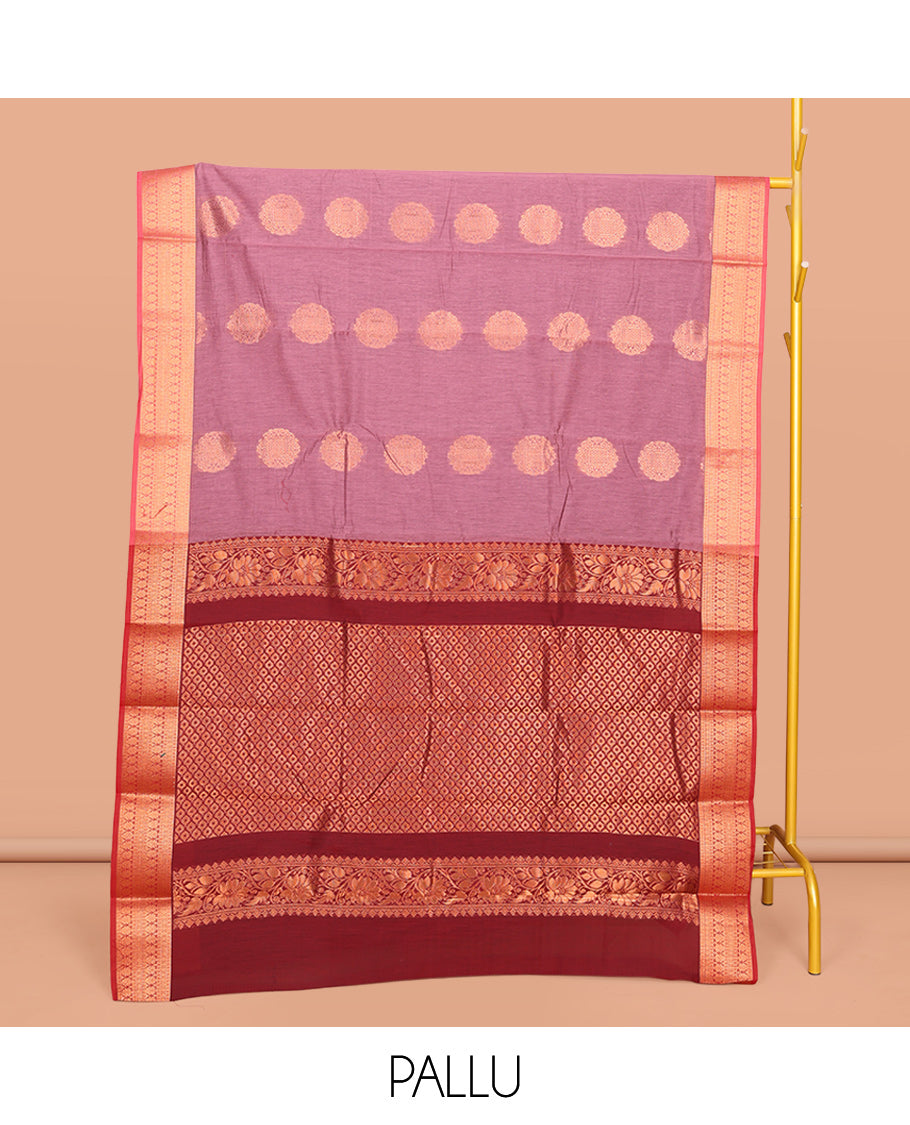 Pink Semi-Silk Cotton Saree, Enthralled with Zari Buttas All Over Its Body, Complemented by a Contrast Border of Traditional Zari Designs, Grand Jaal Pallu, and Paired with a Contrast Blouse
