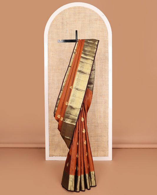 Orange zari design Vasundhara silk mix, contrast border of rekku, kamalam, kodi mayil, and jaal designs, and geometric pallu