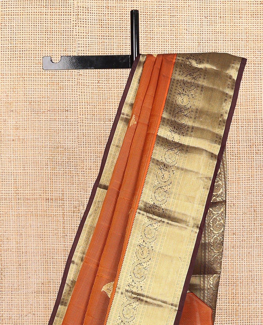 Orange zari design Vasundhara silk mix, contrast border of rekku, kamalam, kodi mayil, and jaal designs, and geometric pallu
