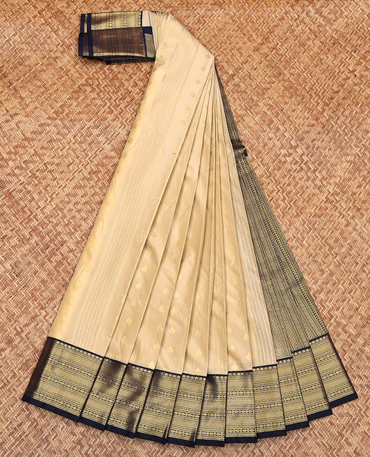 Beige Budget Silk Saree, Sparsely Woven with Zari Buttas All Over Its Body, Complemented by Contrast Traditional Zari Design Border, Geometric-Patterned Pallu, and Paired with a Contrast Blouse
